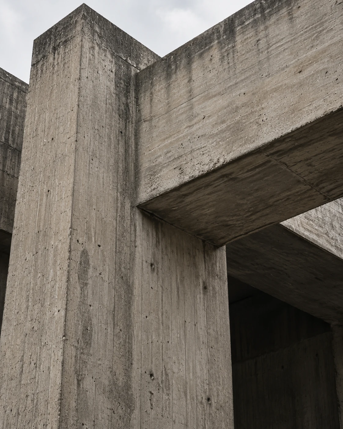 An architectural study of interlocking concrete piers and a cantilevered beam